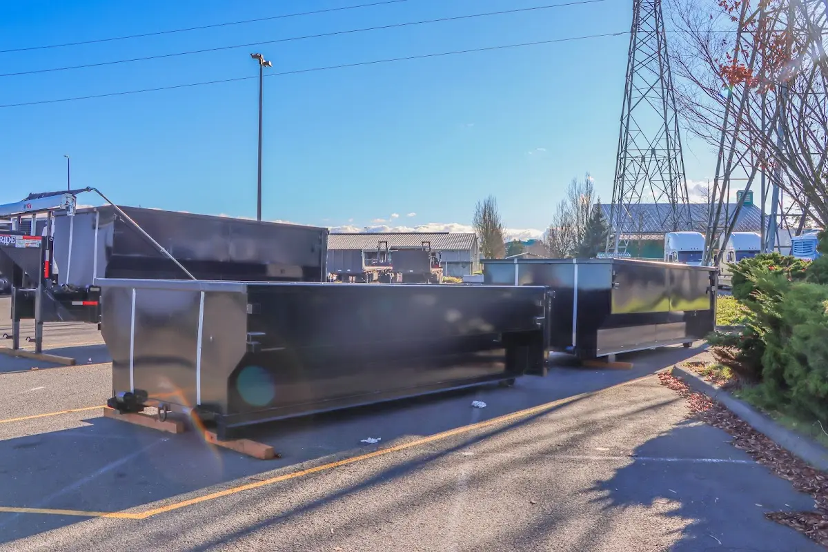 Roll-off dumpster ready for waste disposal at job site for 12 Yard Dumpster Rental in Sheridan